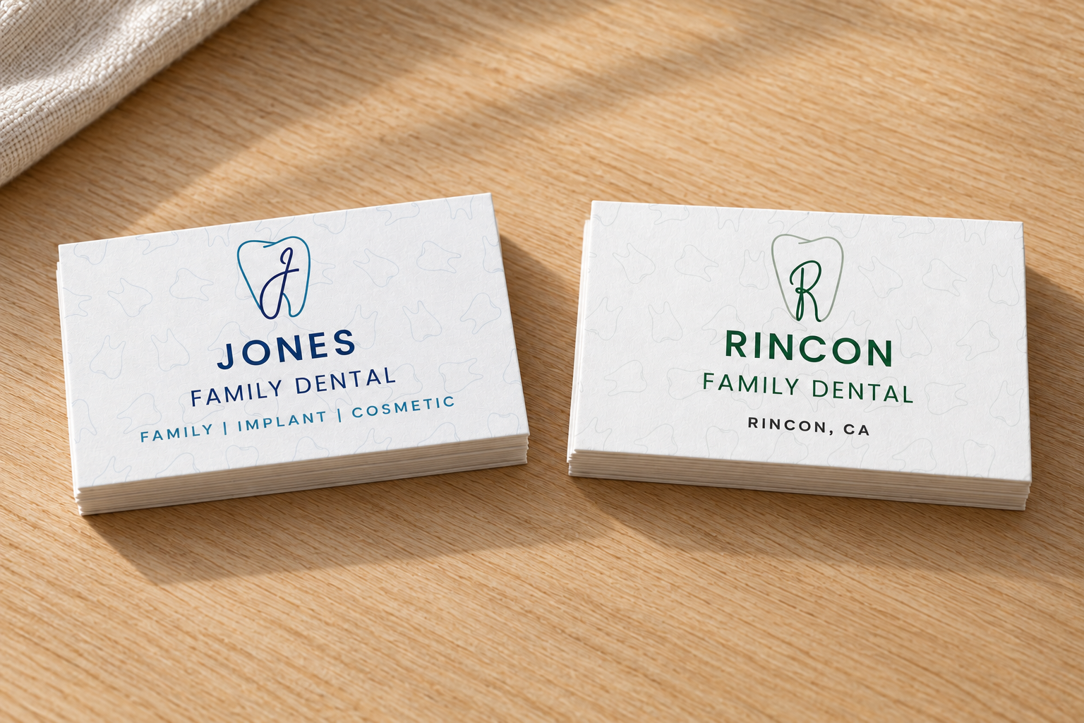 Jones and Rincon business-card designs / desk mockup